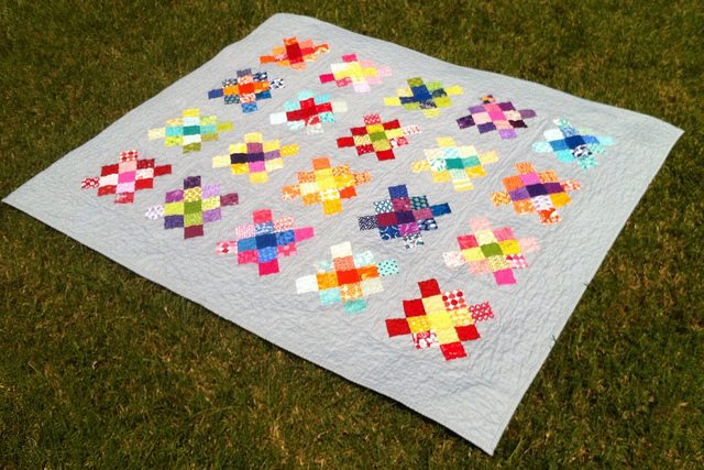 scrappy granny square quilt.