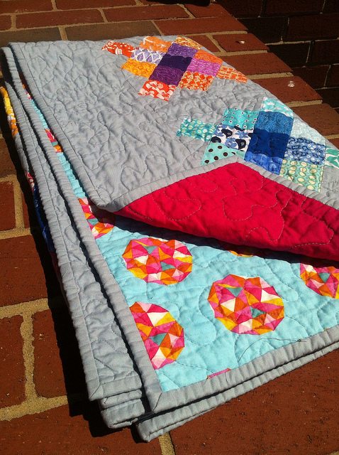 granny square quilt folded.