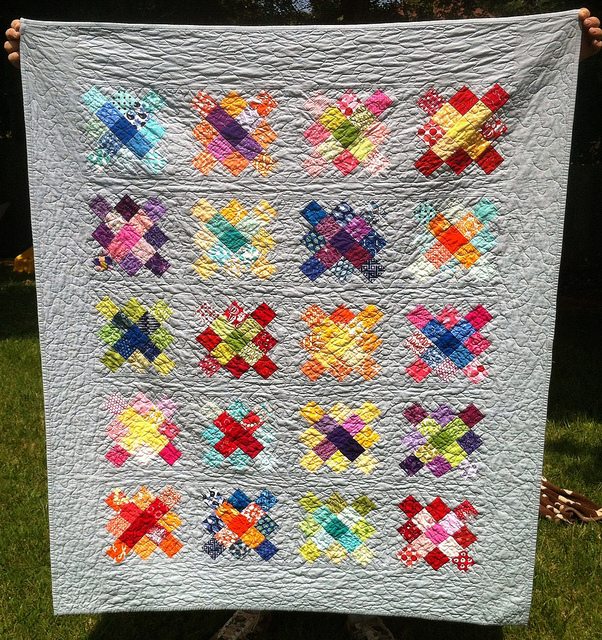 scrappy granny square quilt.